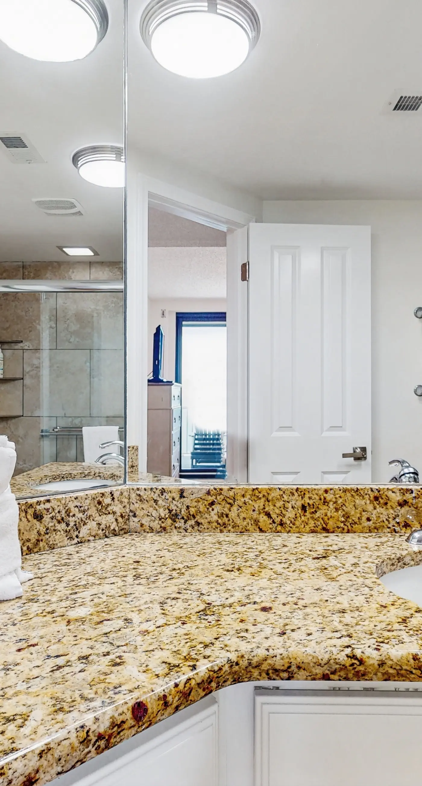 Gorgeous beachfront condo with open layout, pools, tennis, & gym