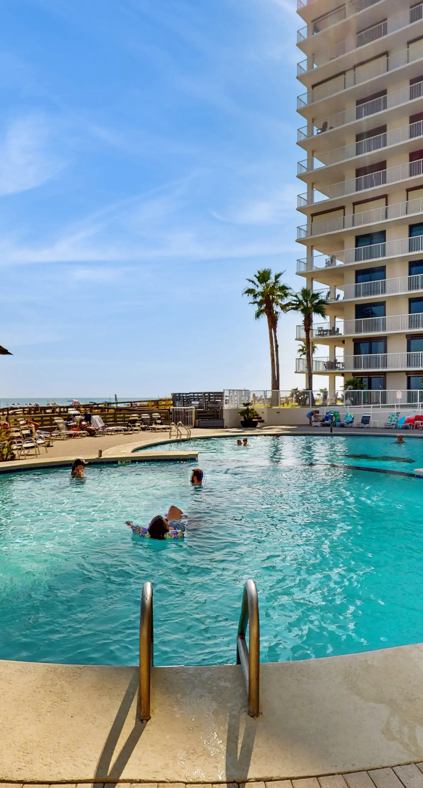 Gulf-front condo with deep corner balcony, beach view, pools & gym