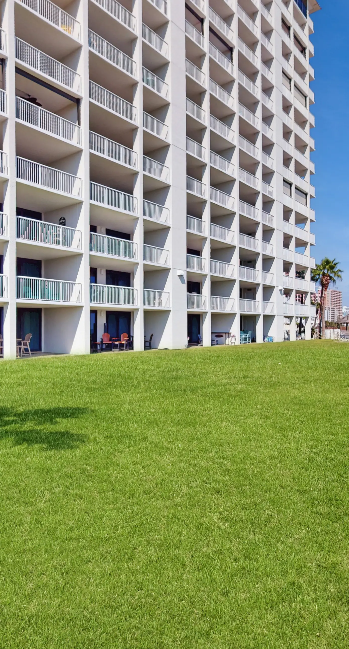 Gulf-front condo with deep corner balcony, beach view, pools & gym