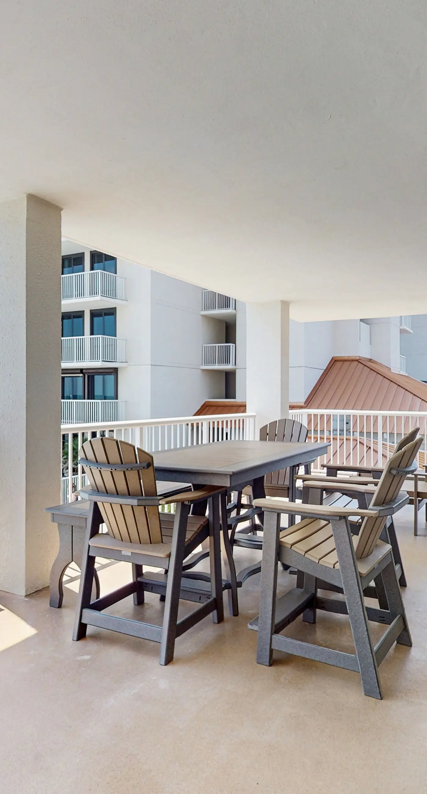 Gulf-front condo with furnished balcony, pools & hot tub