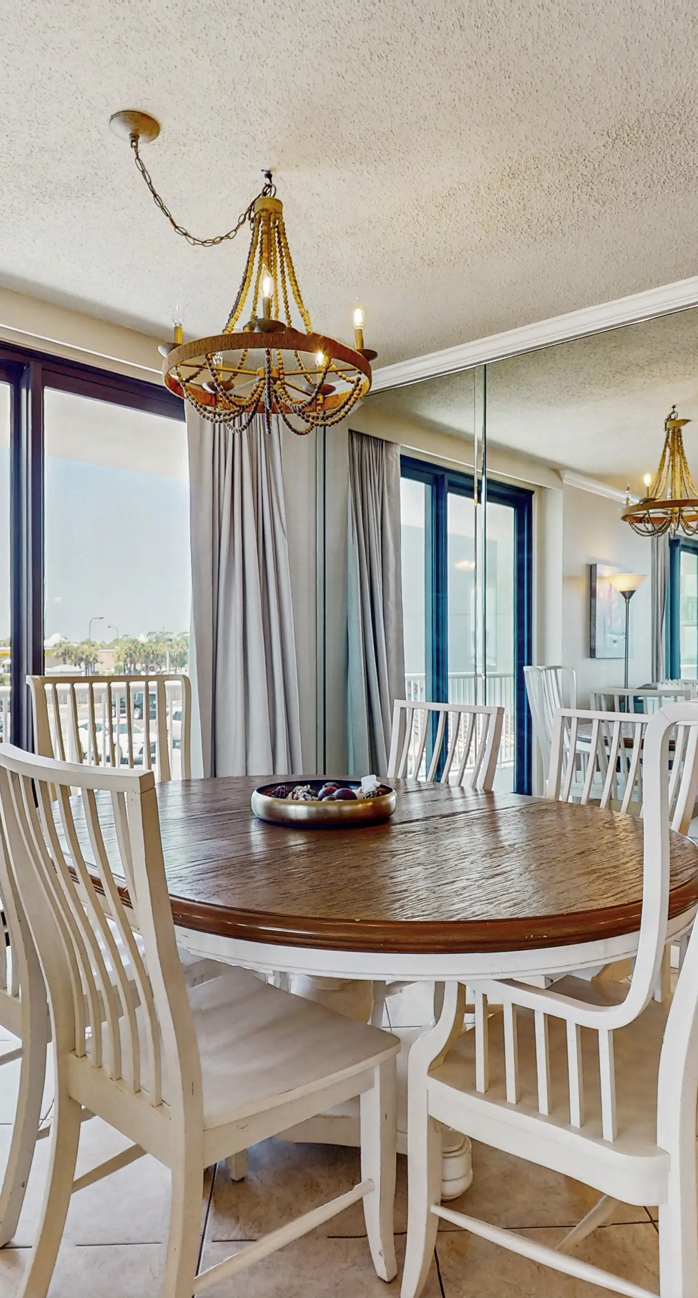 Gulf-front condo with furnished balcony, pools & hot tub