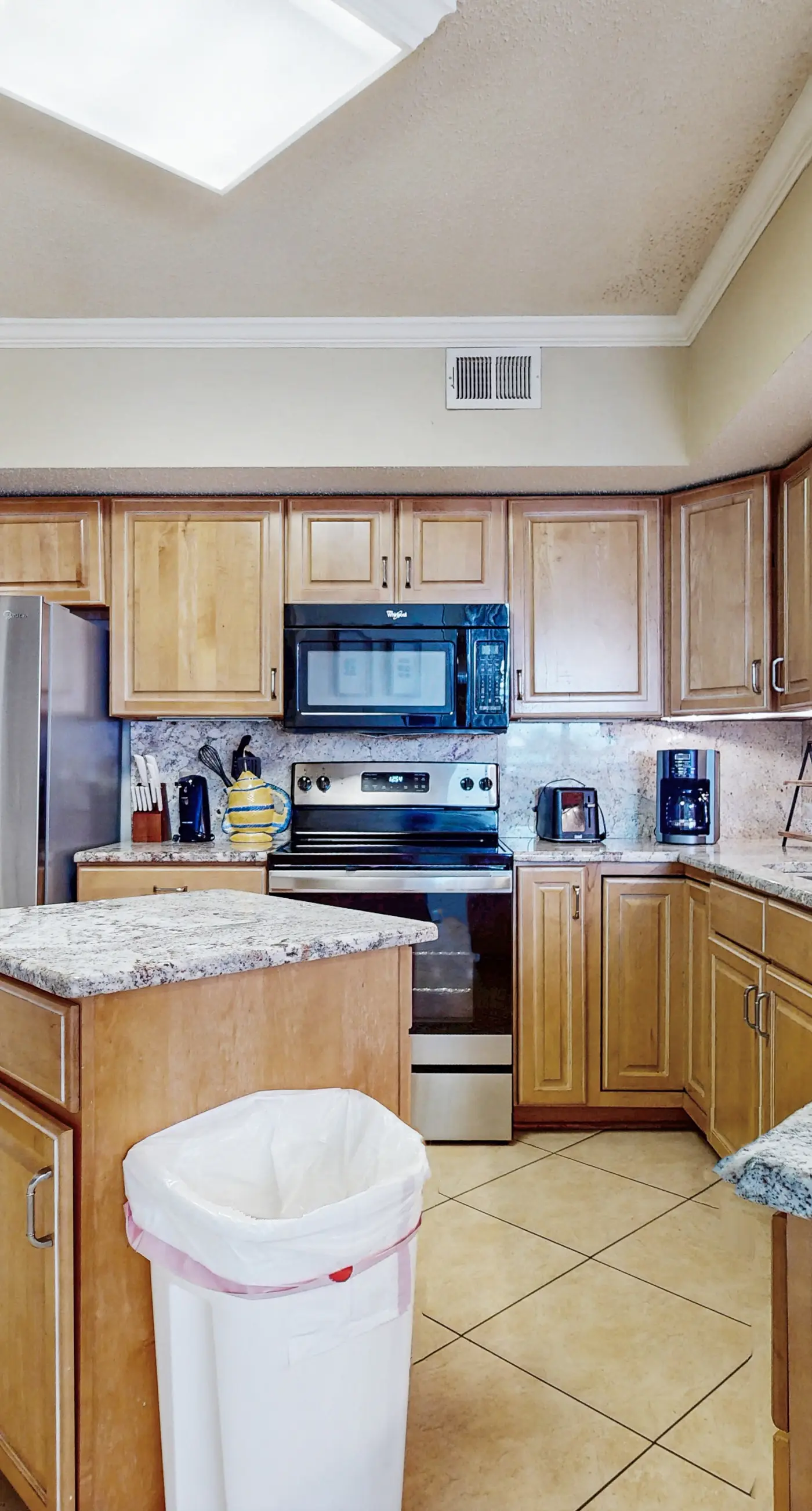 Gulf-front condo with furnished balcony, pools & hot tub