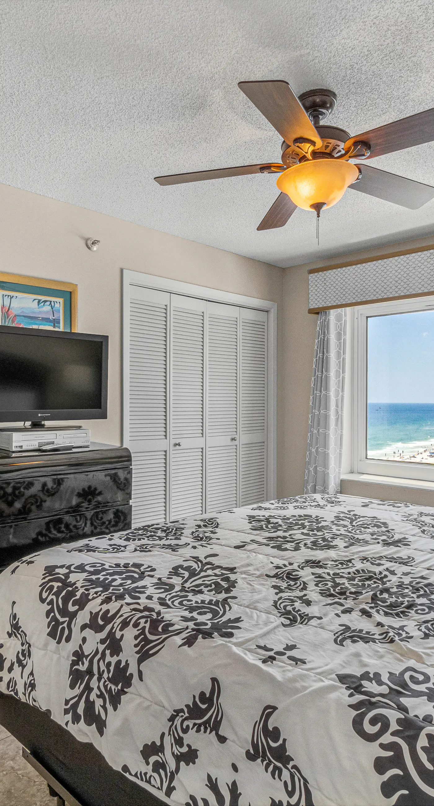 Stunning beachfront condo w/ a full kitchen, private balcony, & shared pools
