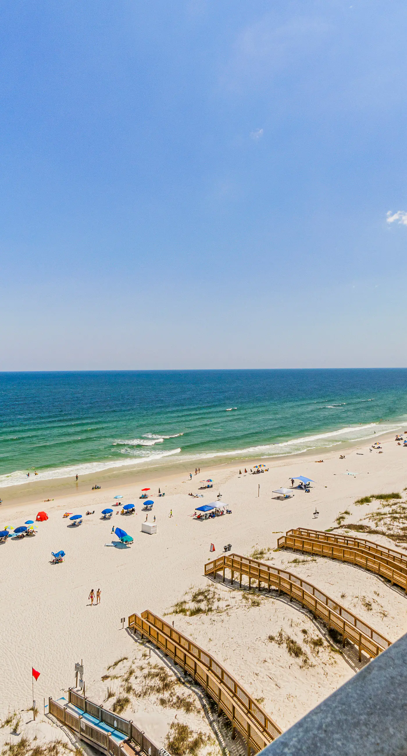 Stunning beachfront condo w/ a full kitchen, private balcony, & shared pools