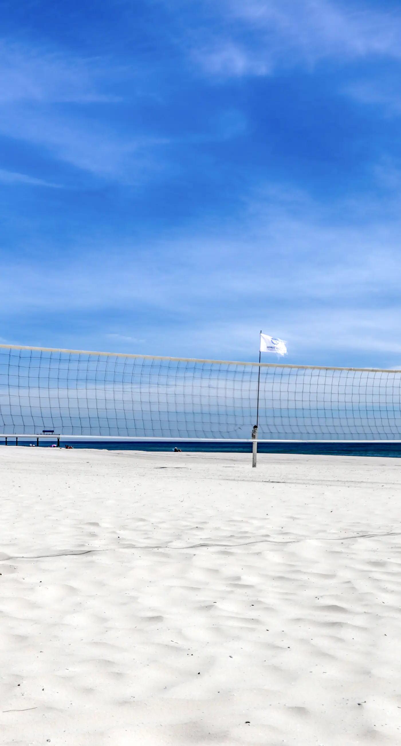 Stunning beachfront condo w/ a full kitchen, private balcony, & shared pools