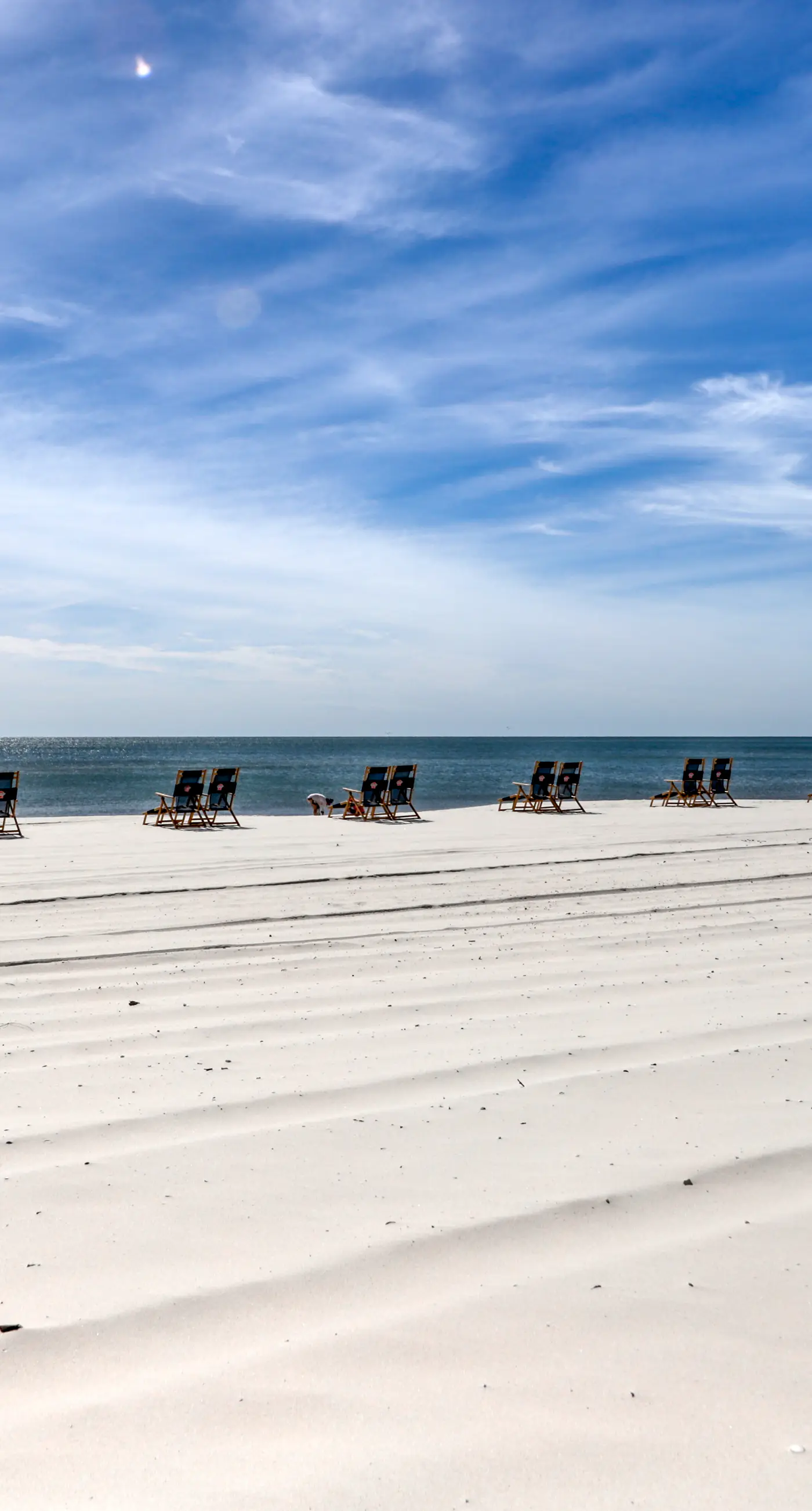 Stunning beachfront condo w/ a full kitchen, private balcony, & shared pools