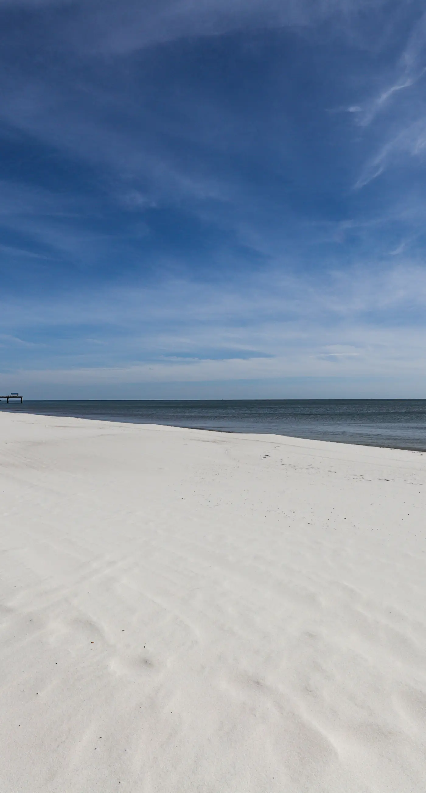 Stunning beachfront condo w/ a full kitchen, private balcony, & shared pools