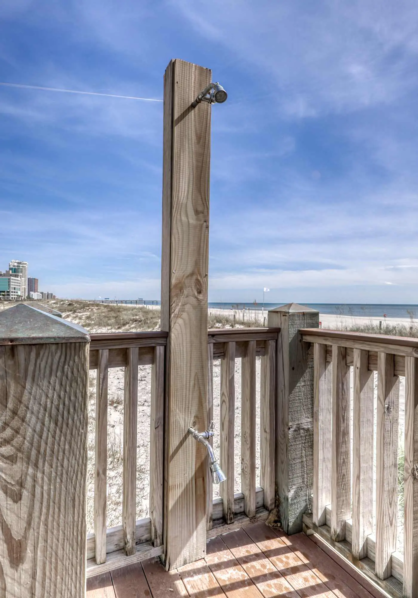 Stunning beachfront condo w/ a full kitchen, private balcony, & shared pools