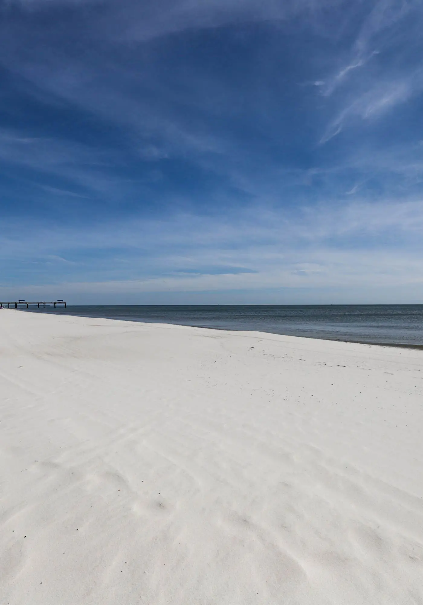 Stunning beachfront condo w/ a full kitchen, private balcony, & shared pools