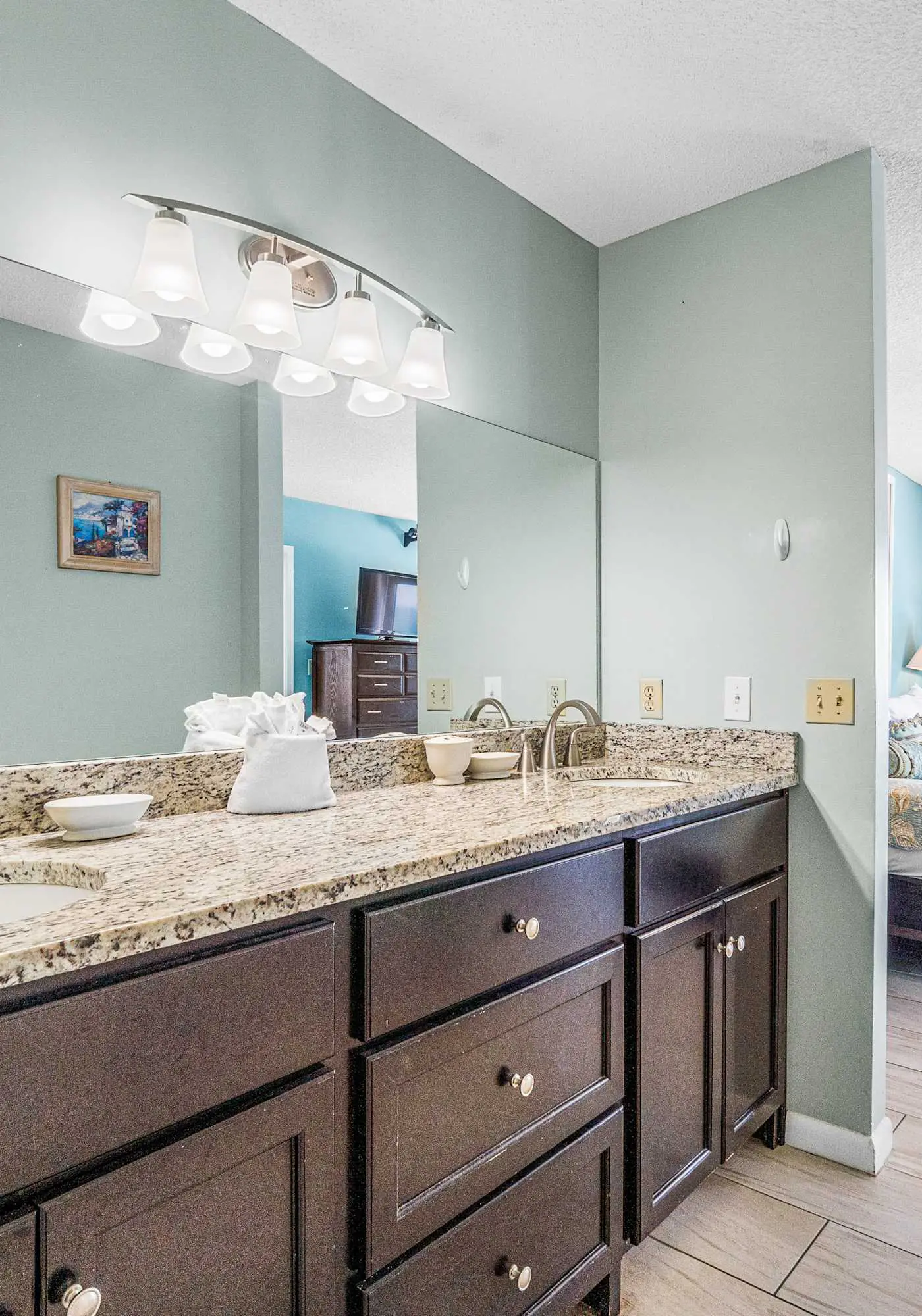 Stunning beachfront condo w/ a full kitchen, private balcony, & shared pools