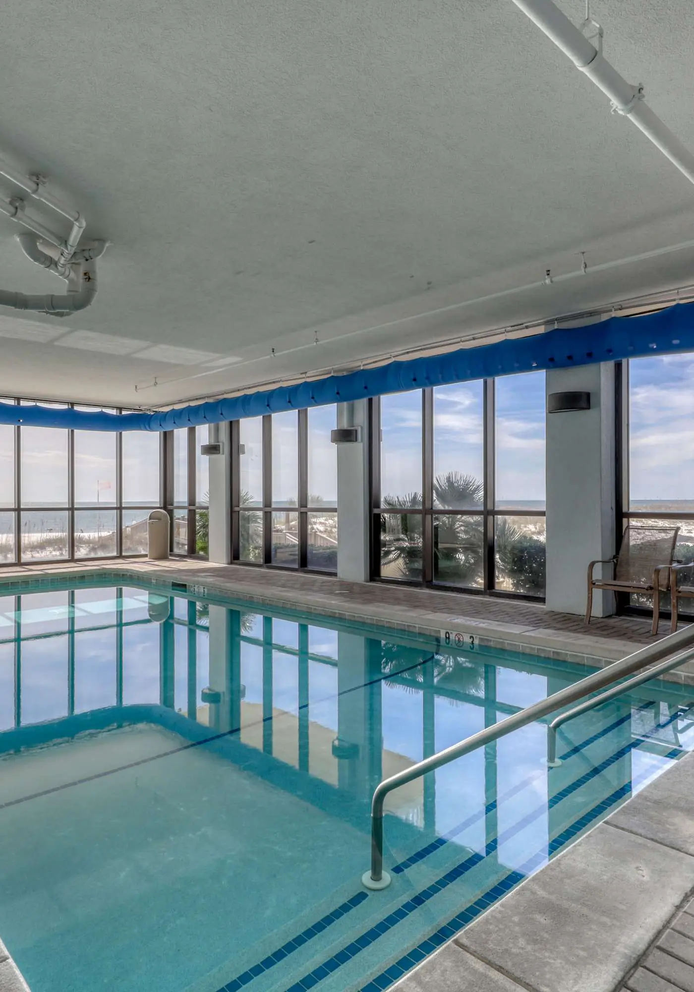Stunning beachfront condo w/ a full kitchen, private balcony, & shared pools