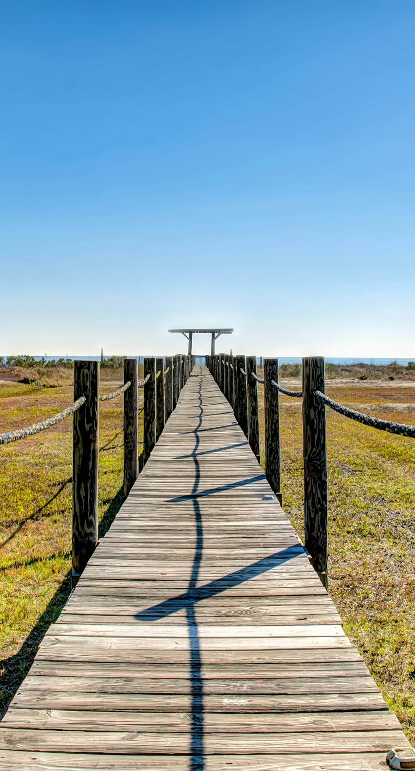 Quiet home with WiFi, pool, view of water, & boardwalk to beach