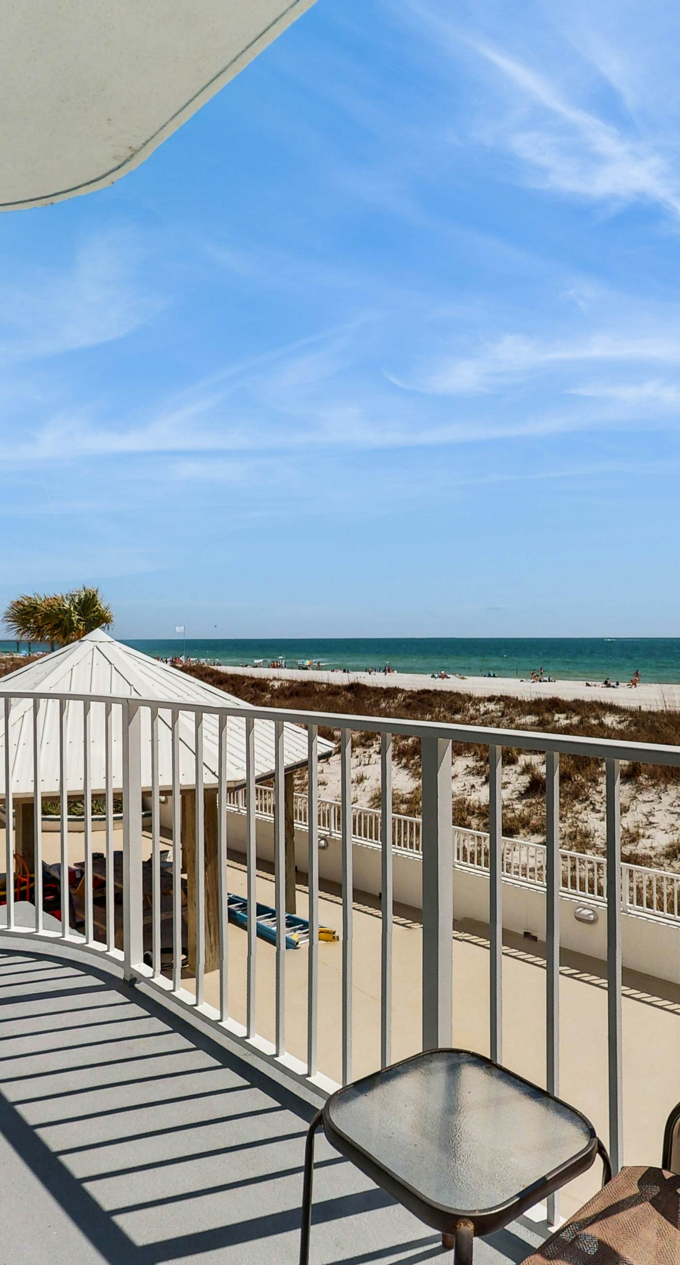 Beachfront condo with stunning views, pool, WiFi, and washer/dryer