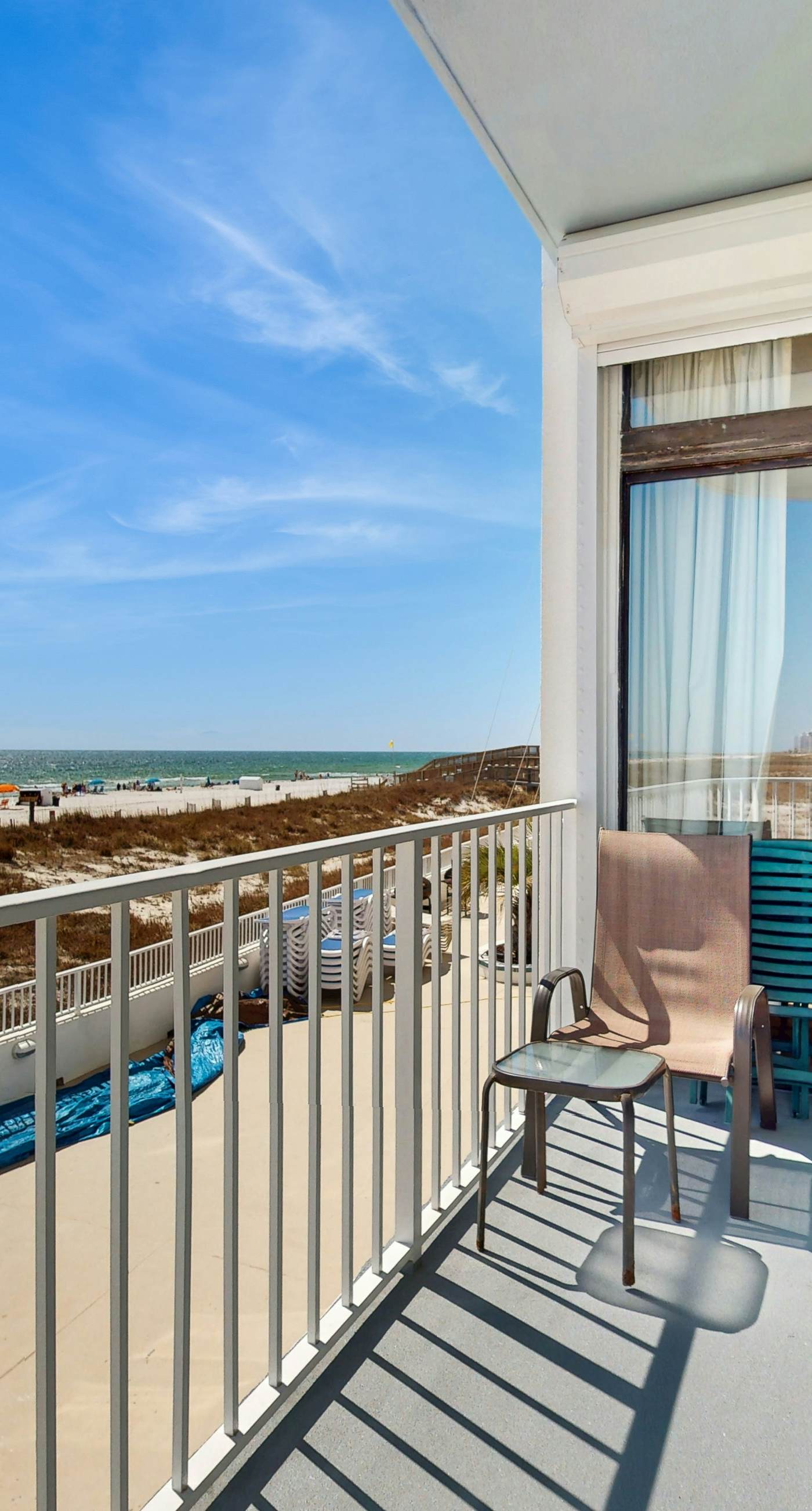 Beachfront condo with stunning views, pool, WiFi, and washer/dryer