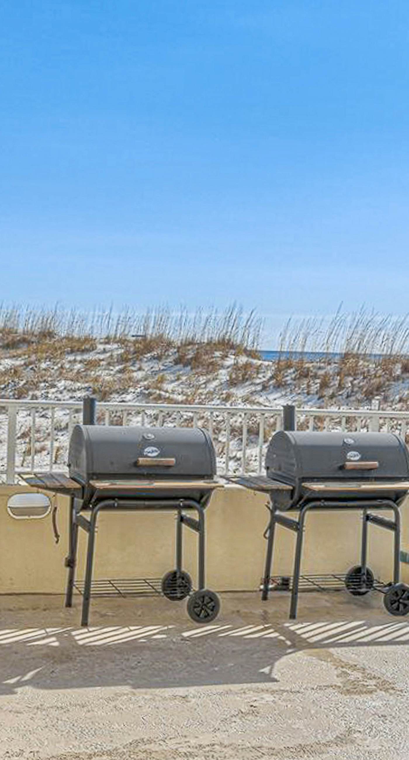 Beachfront condo with stunning views, pool, WiFi, and washer/dryer