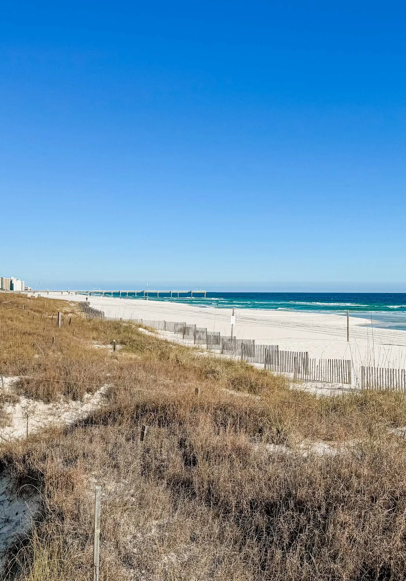 Beachfront condo with stunning views, pool, WiFi, and washer/dryer