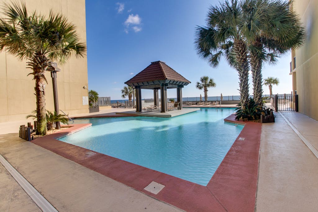 Bright beachfront condo with 2 Gulf-side pools, tennis courts & fitness room