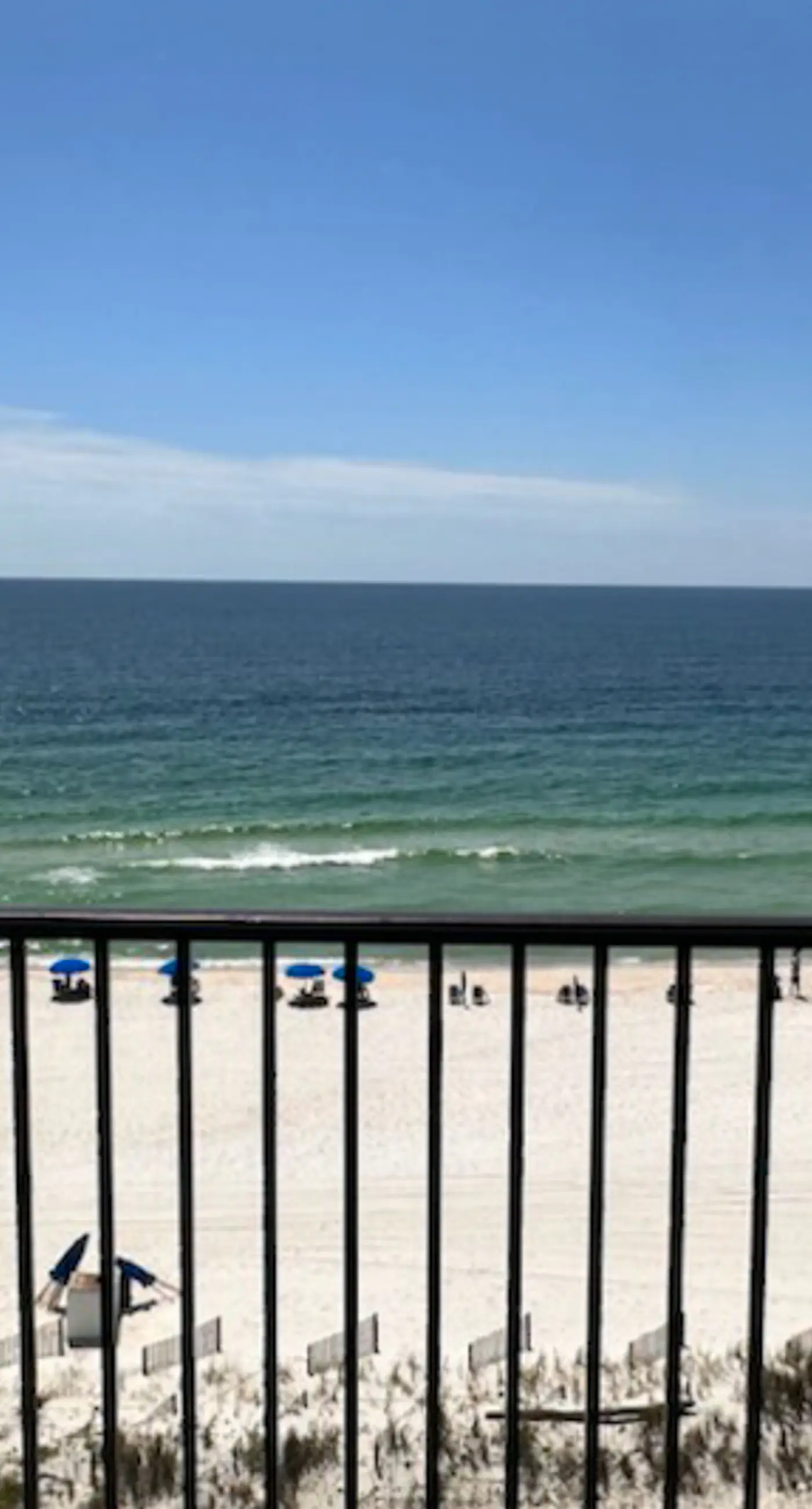 Beachfront condo with pool, private balcony, & washer and dryer!