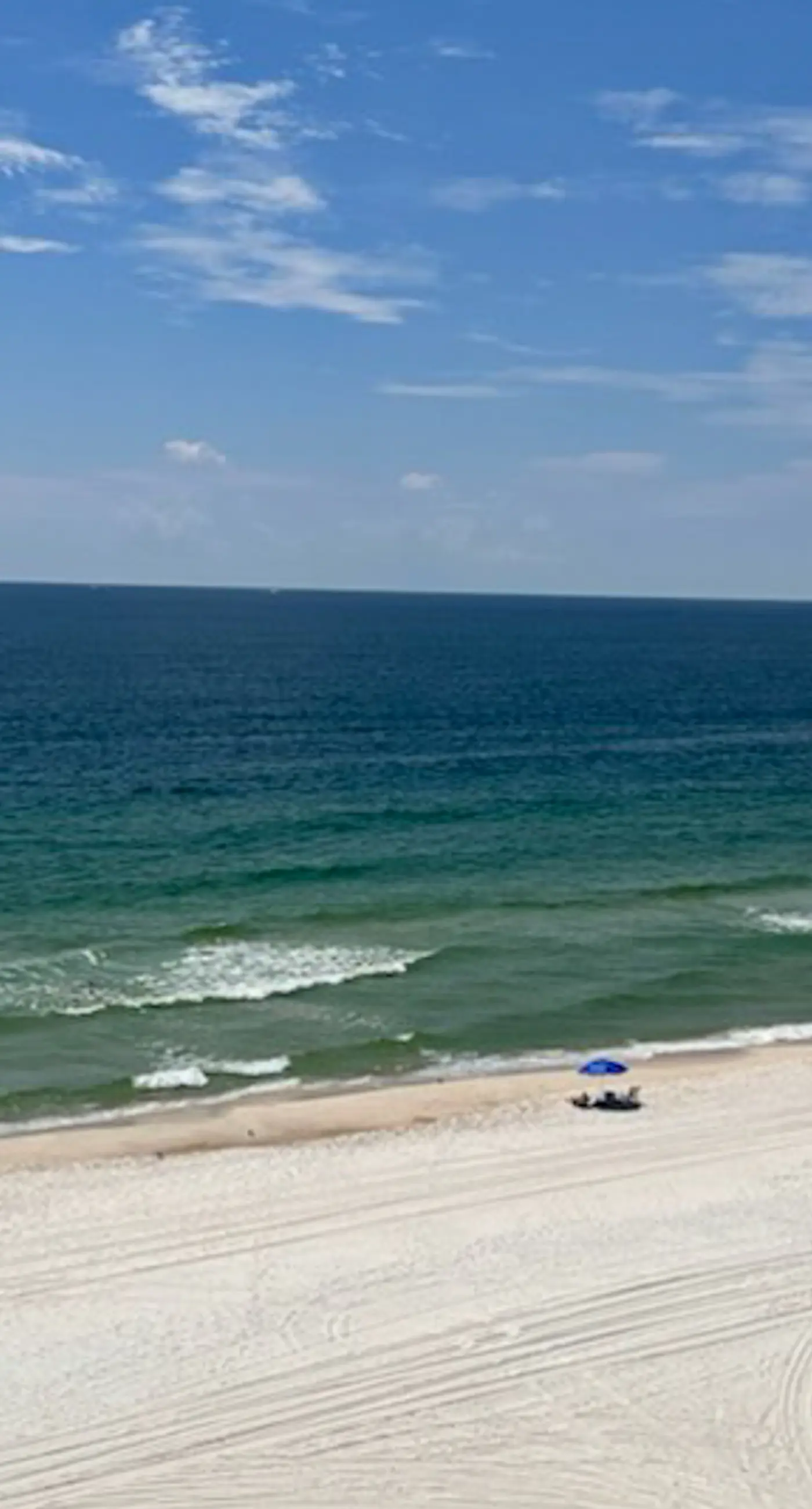 Beachfront condo with pool, private balcony, & washer and dryer!