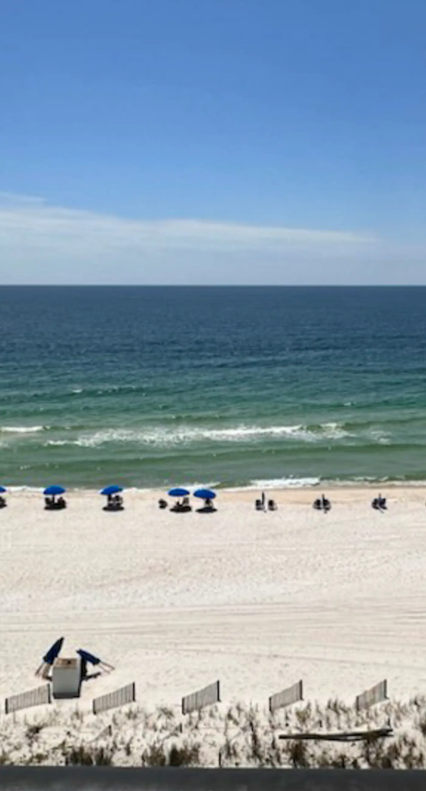 Beachfront condo with pool, private balcony, & washer and dryer!