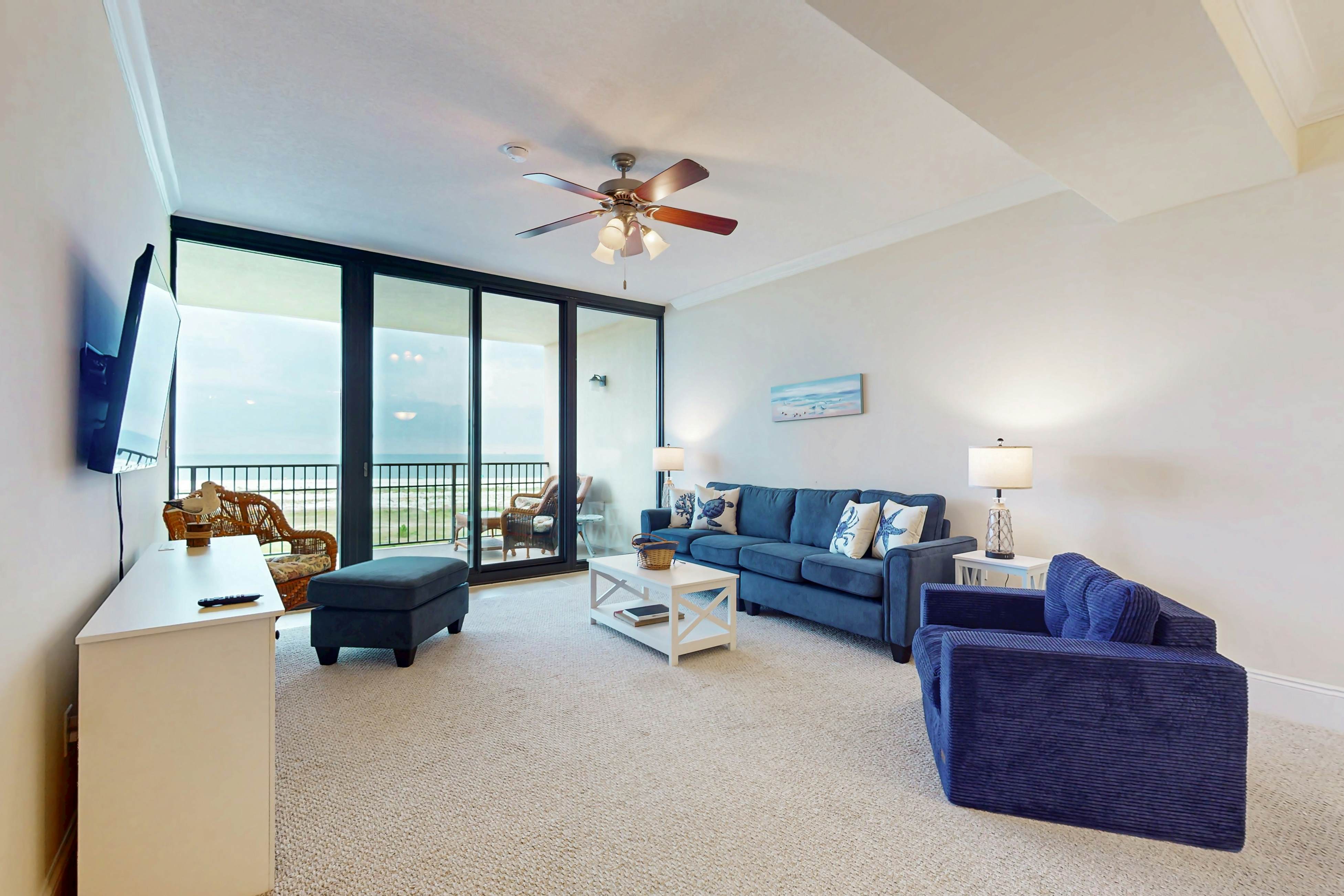 Beachfront condo with pool, private balcony, and washer and dryer