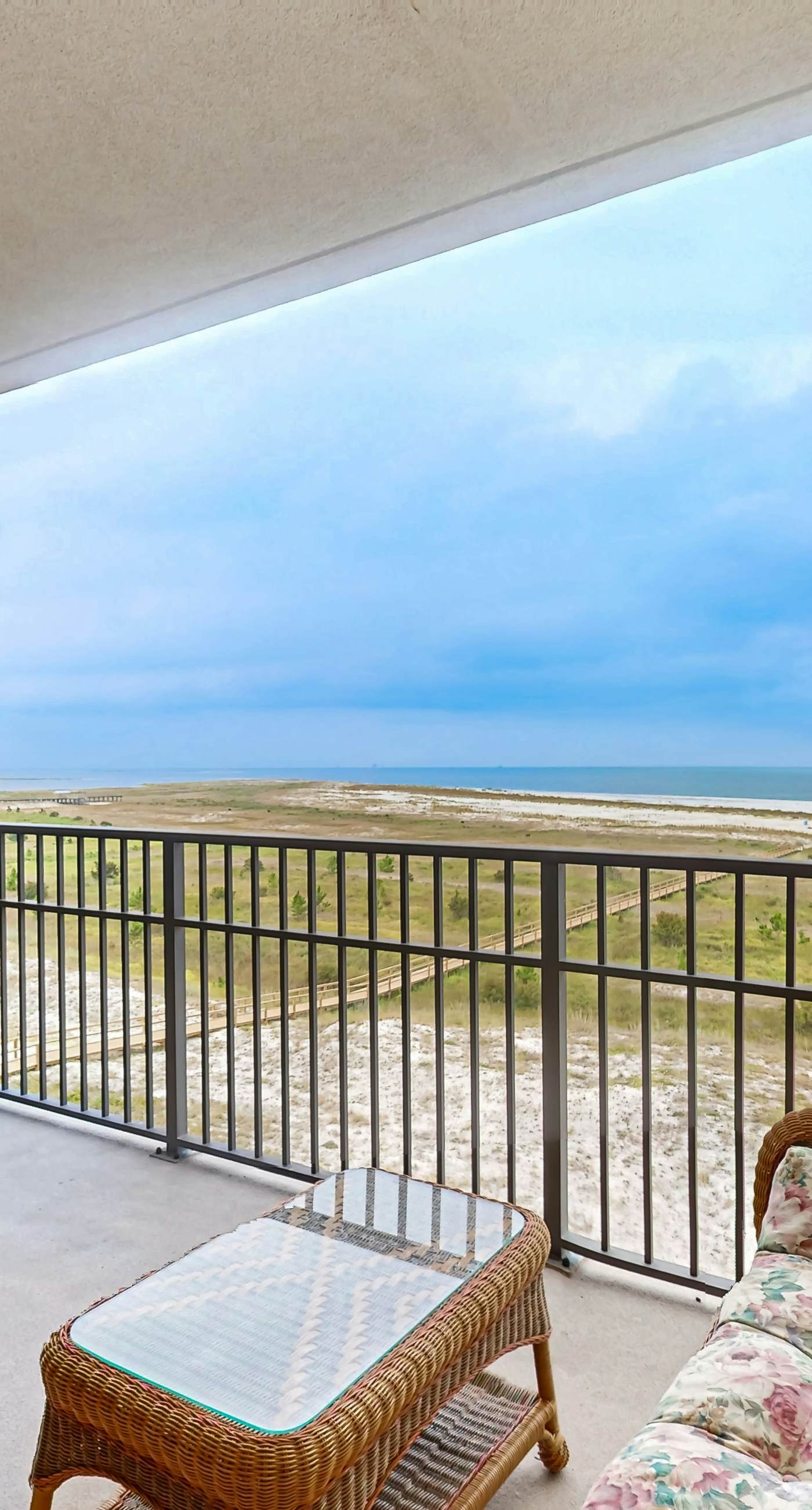 Beachfront condo with pool, private balcony, and washer and dryer