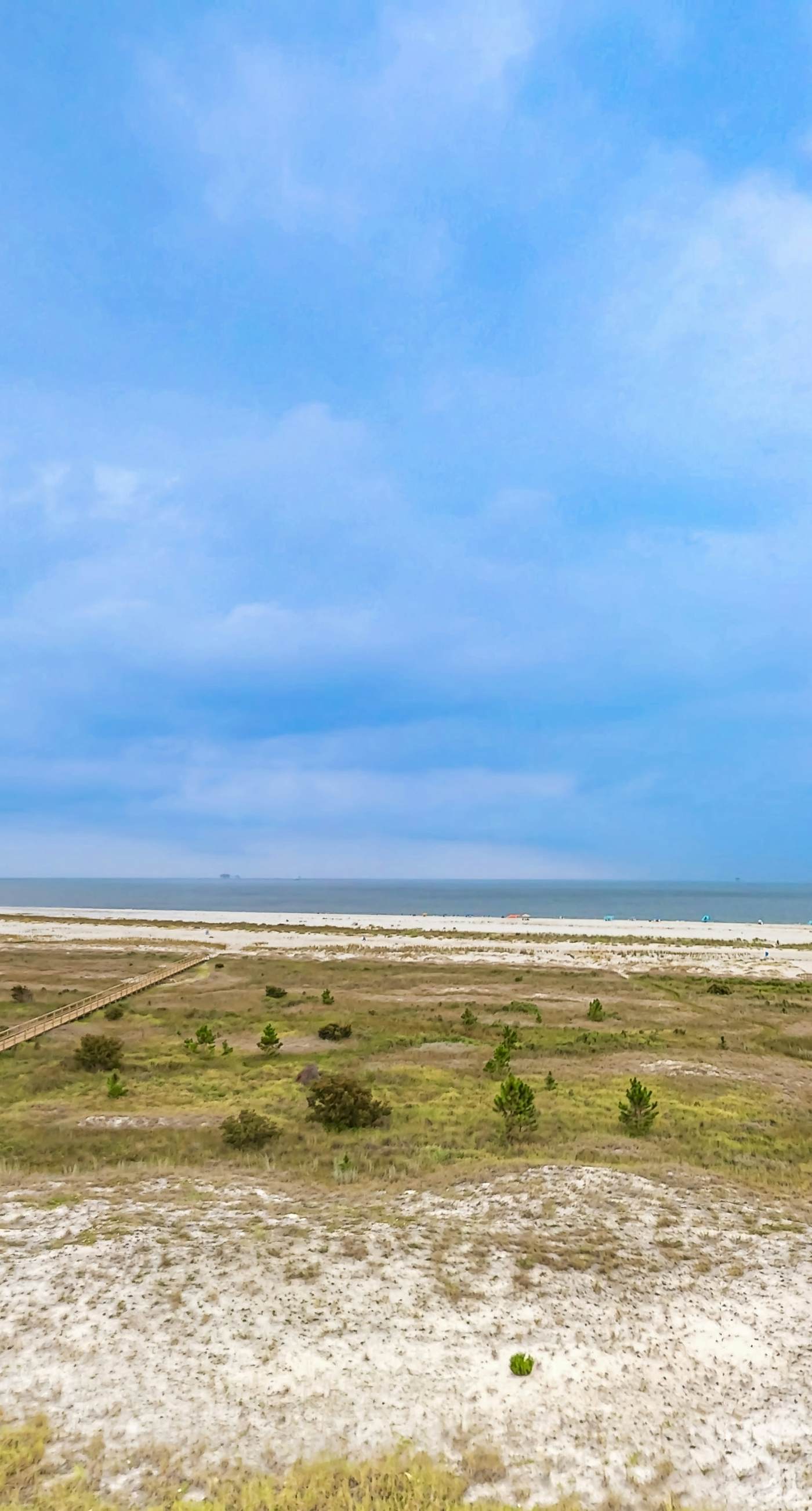 Beachfront condo with pool, private balcony, and washer and dryer