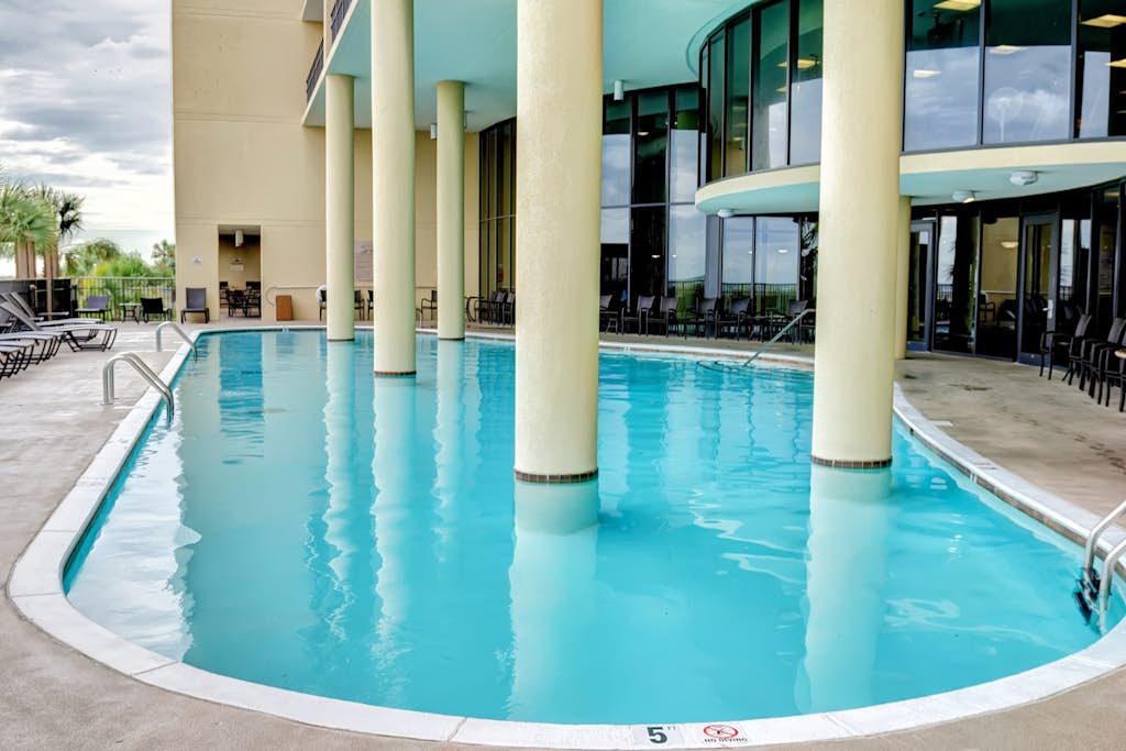 Beachfront condo with pool, private balcony, and washer and dryer