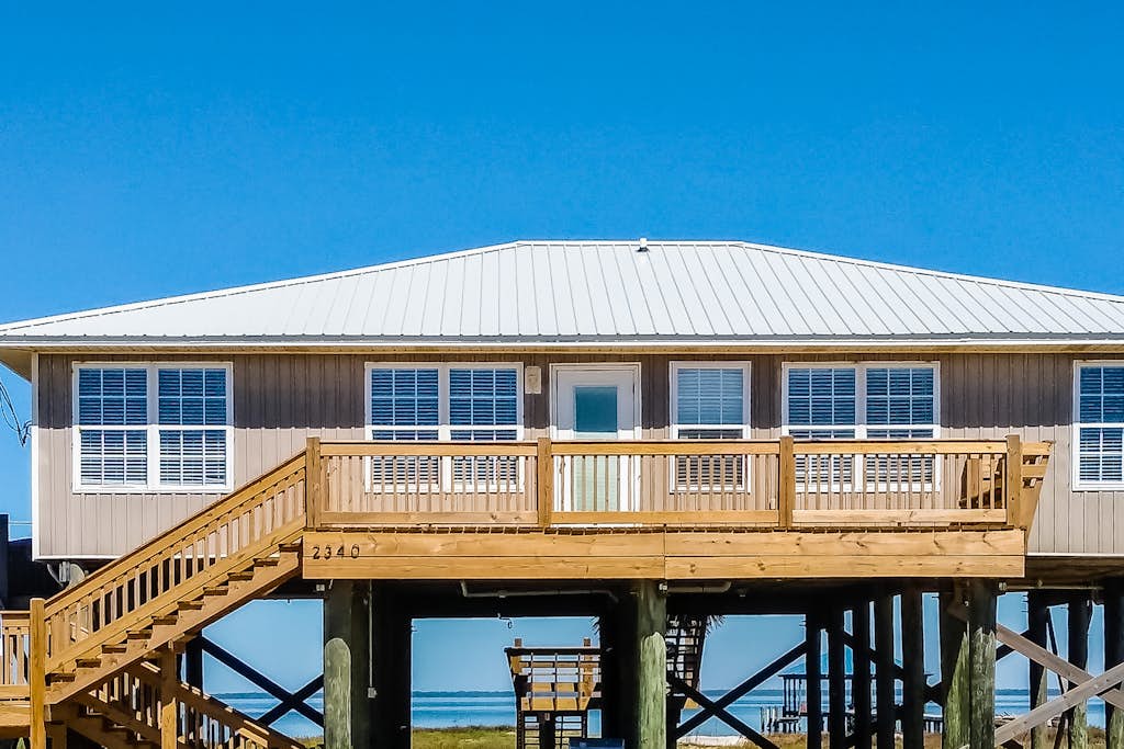 Dog-friendly home with sound-side deck, full kitchen, & fantastic views