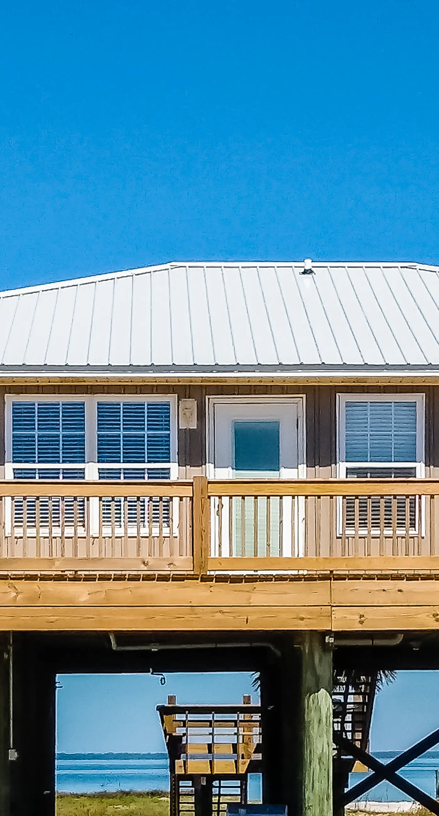 Dog-friendly home with sound-side deck, full kitchen, & fantastic views