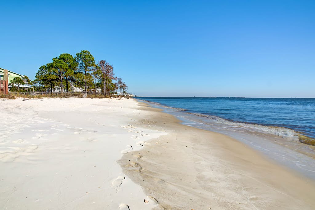 Dog-friendly home with sound-side deck, full kitchen, & fantastic views
