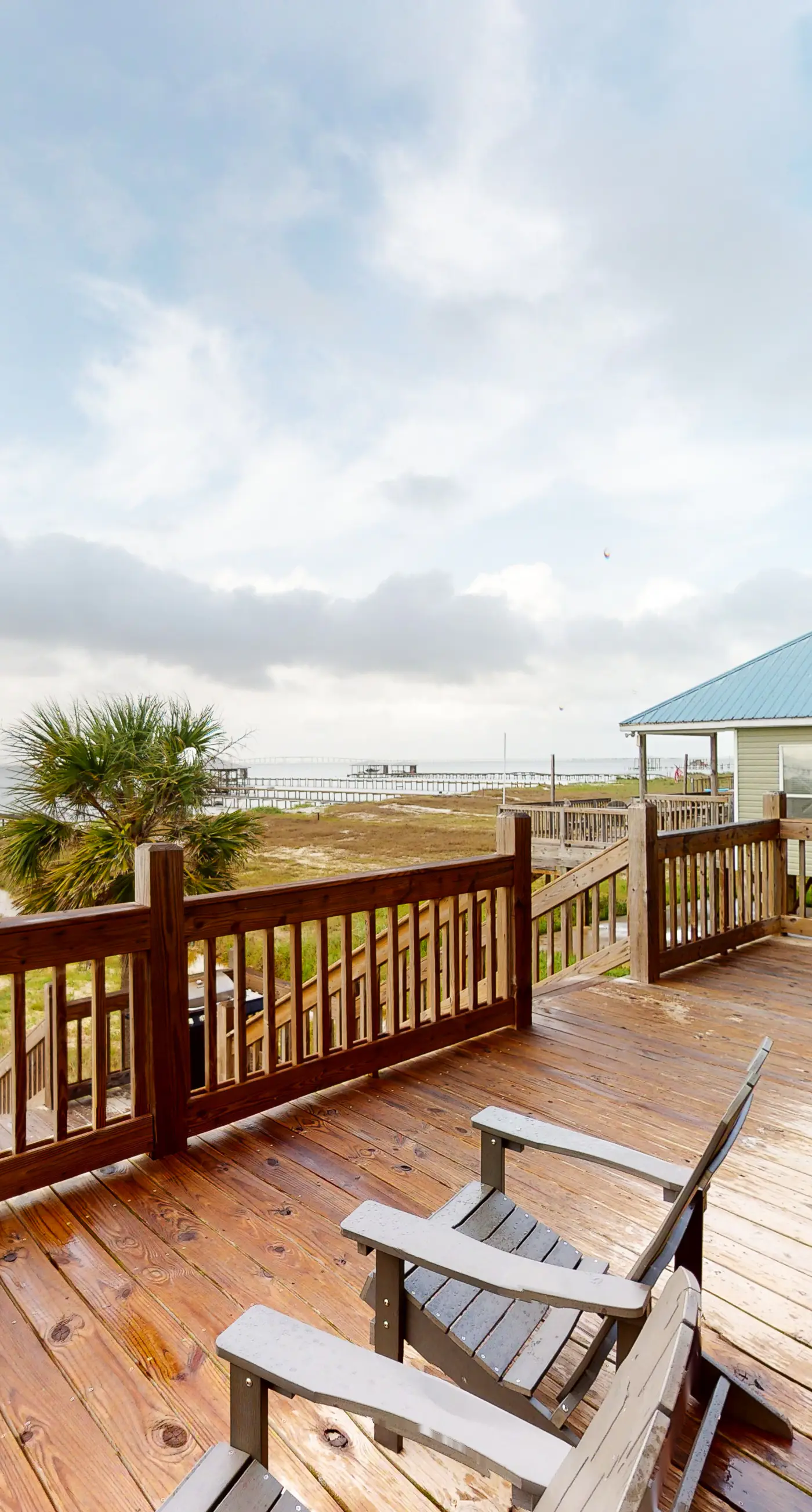 Dog-friendly home with sound-side deck, full kitchen, & fantastic views