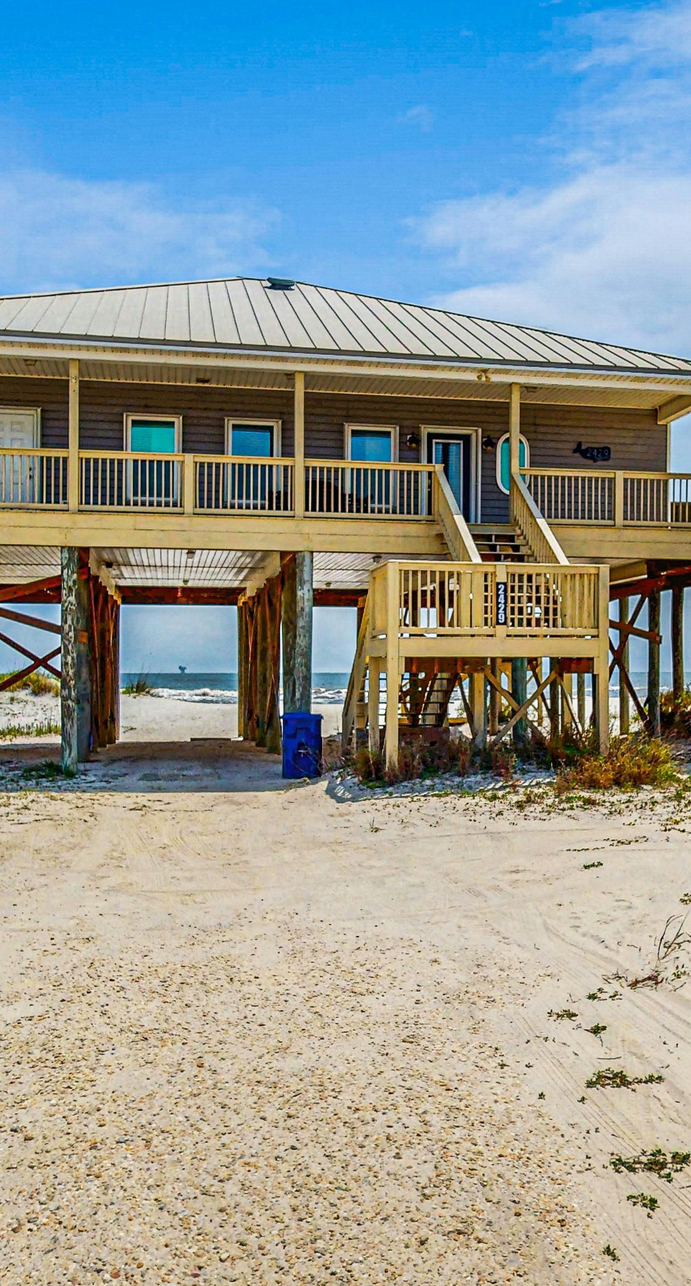 Charming beachfront home with Gulf views & wraparound deck - right on the sand