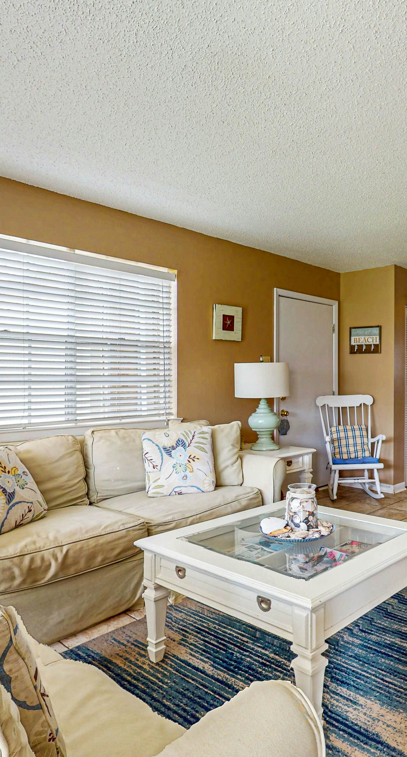 Condo with WiFi, boardwalk to beach, Gulf view, pool, & picnic area