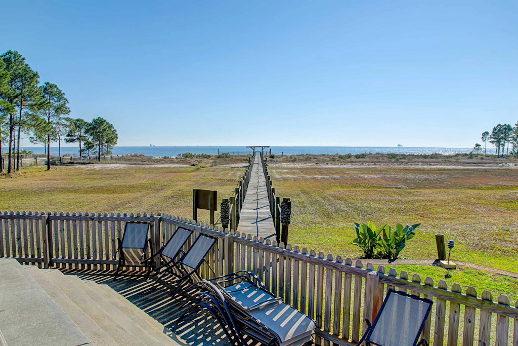 Condo with WiFi, boardwalk to beach, Gulf view, pool, & picnic area