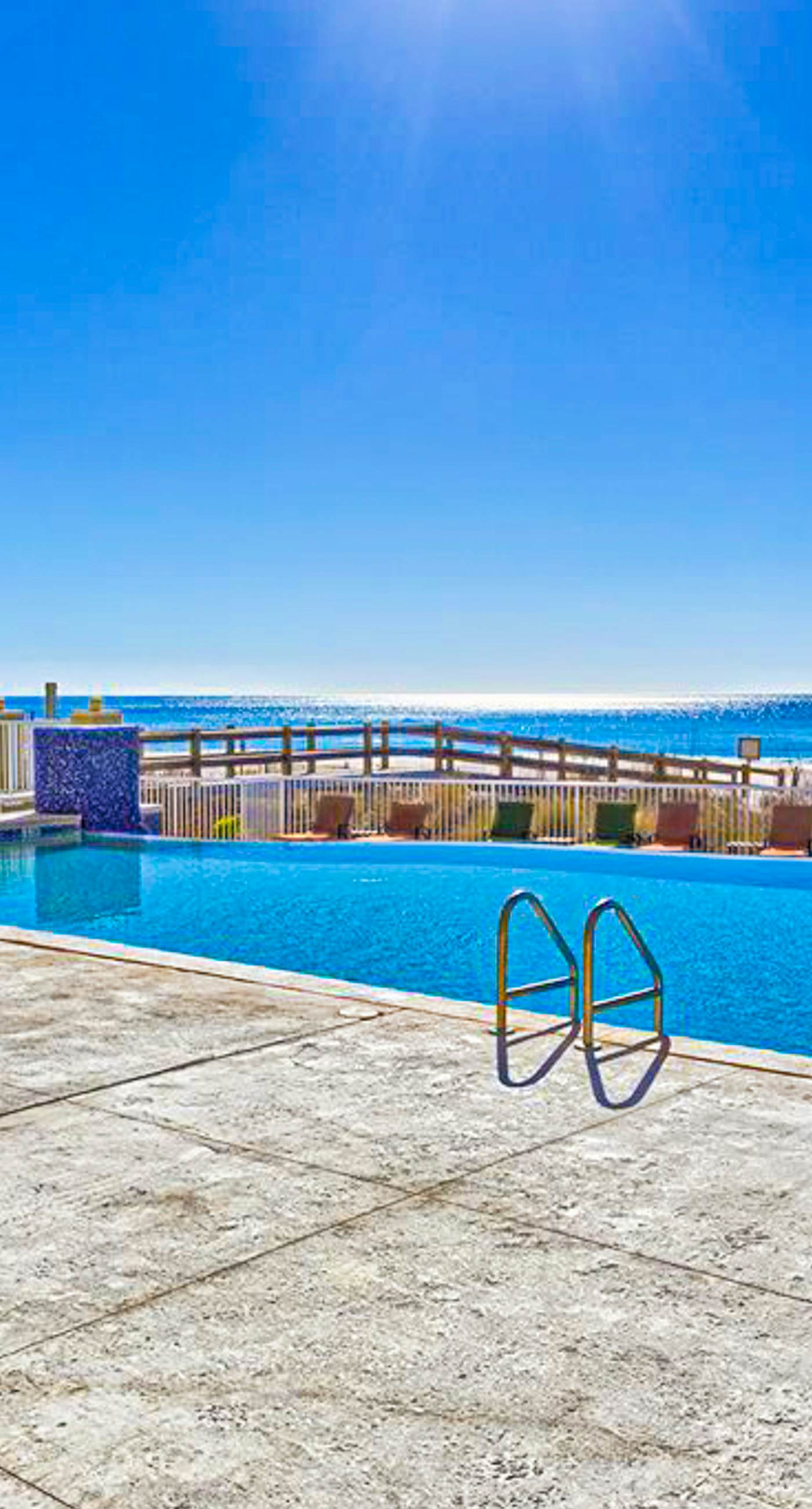 Stunning corner condo with, shared pools, hot tub, gym, beach access & balcony