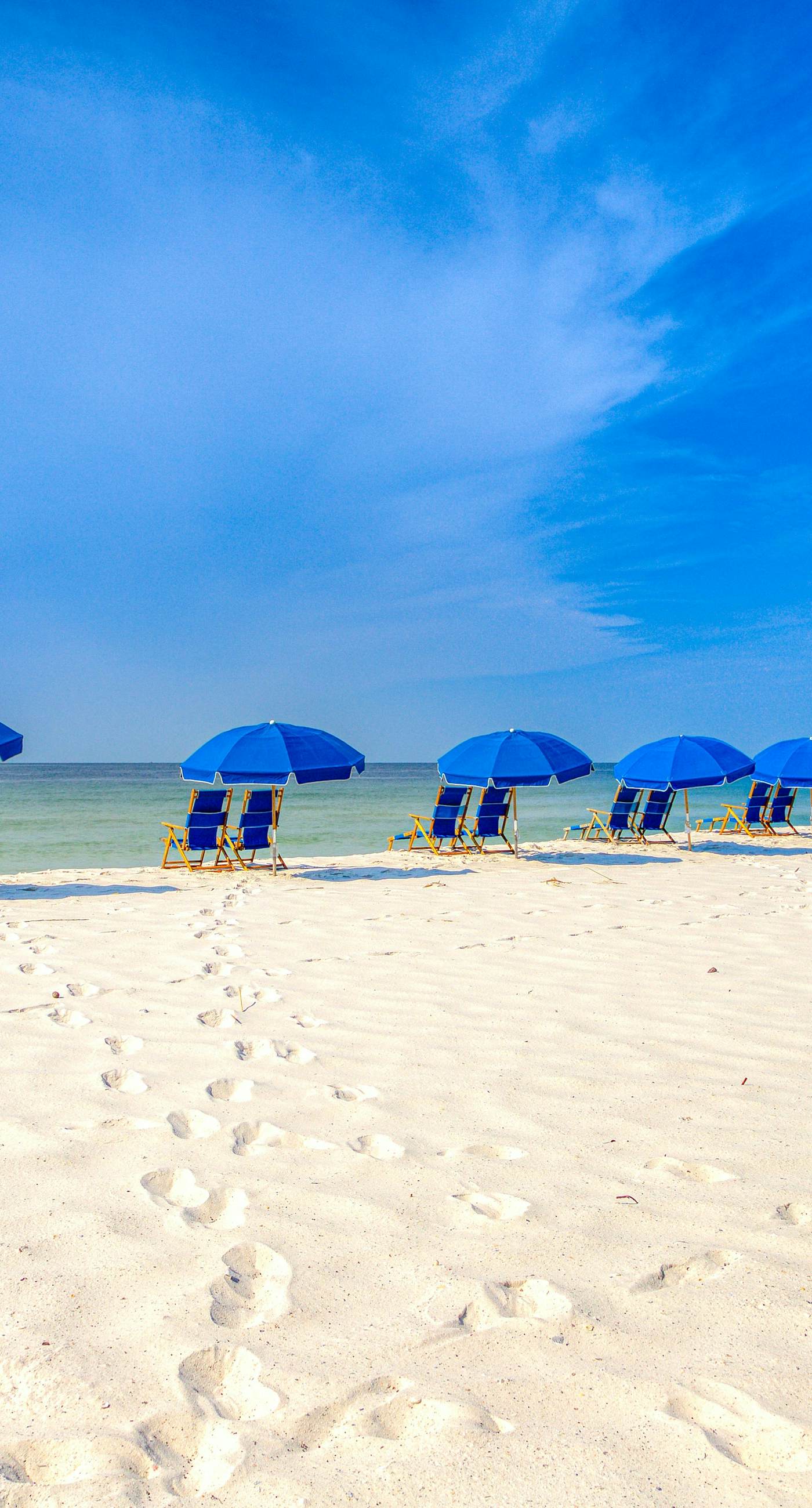 Riverside condo with pool, covered balcony, & easy beach access