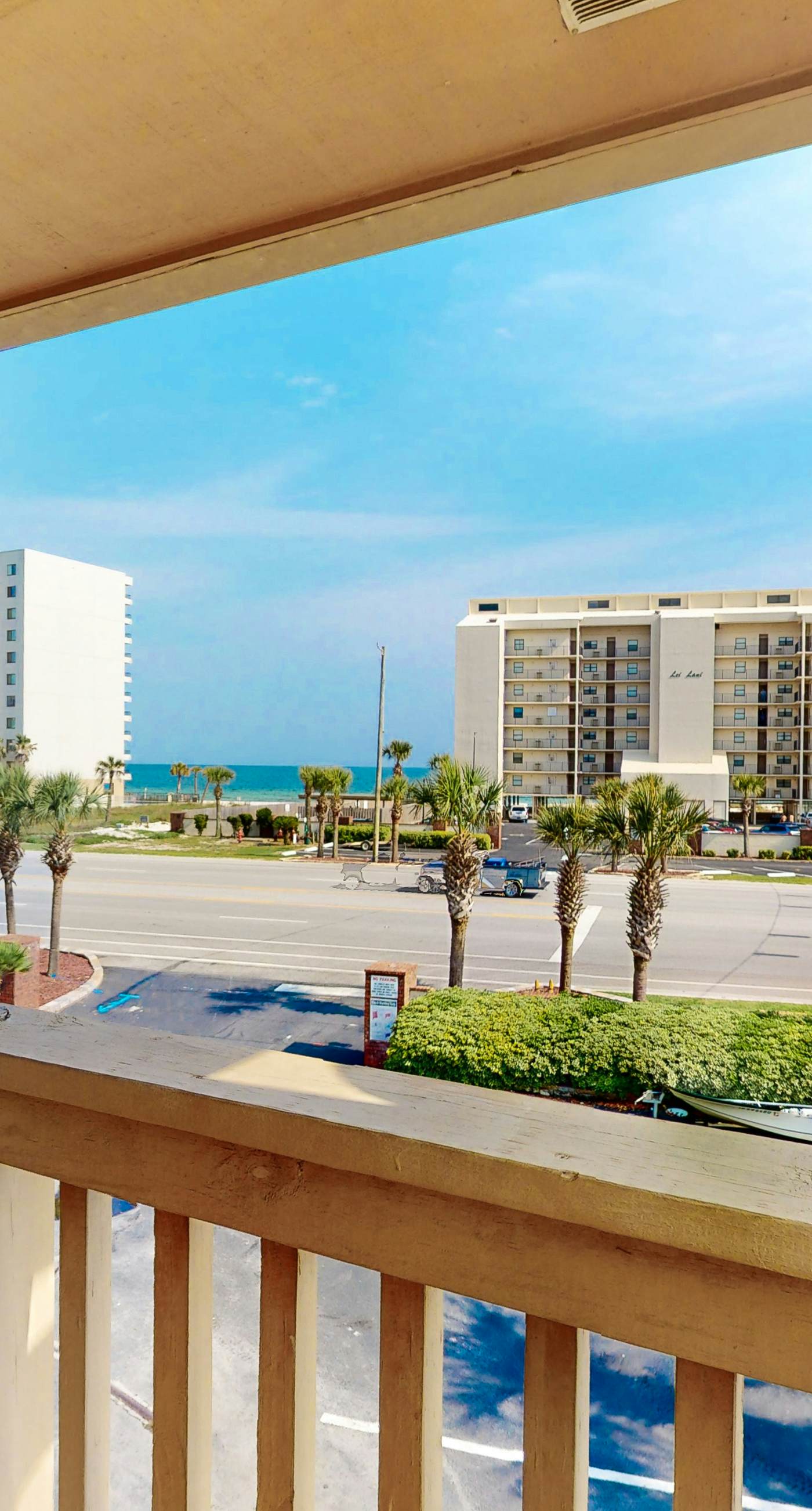 Riverside condo with pool, covered balcony, & easy beach access