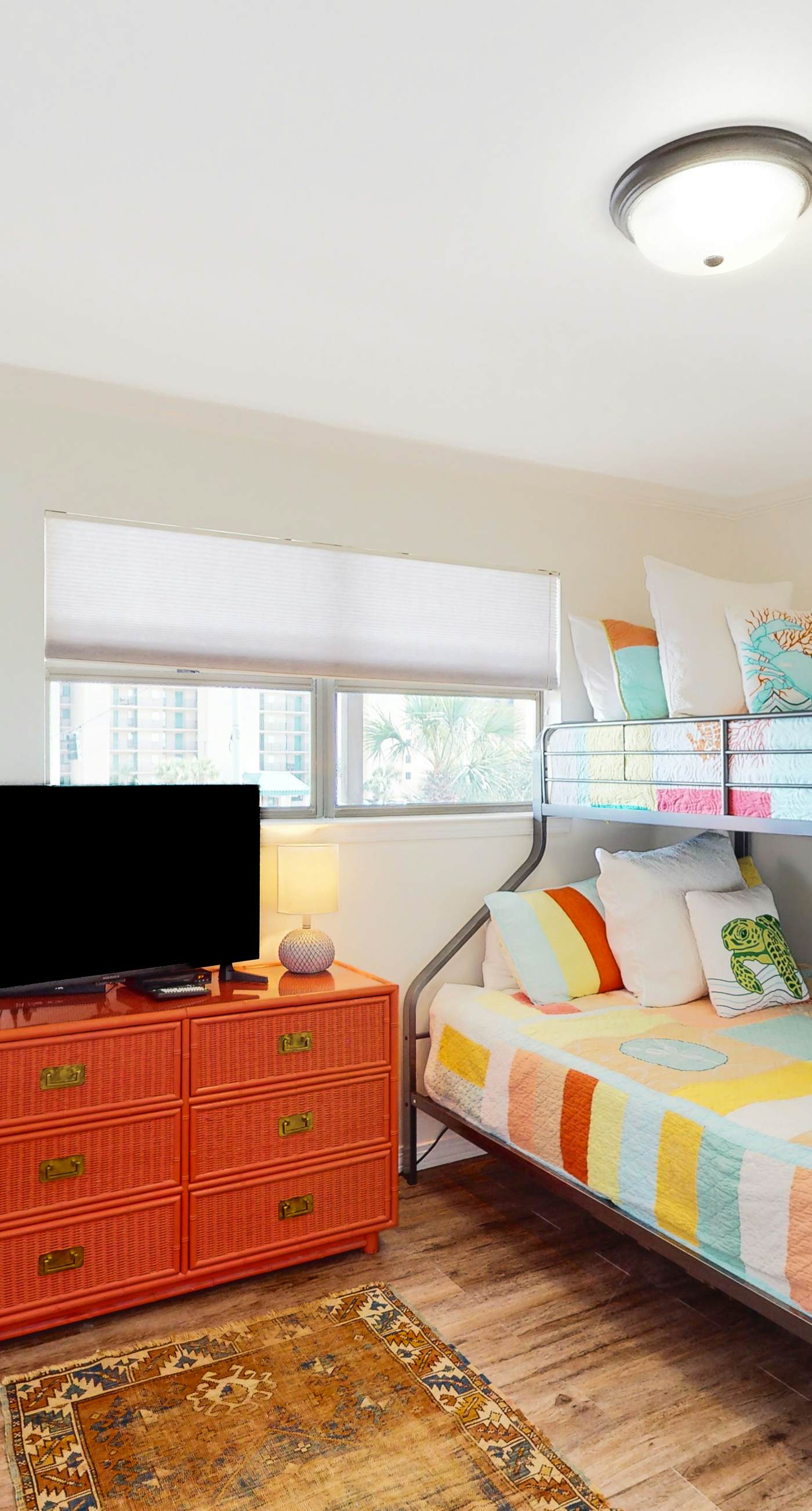 Riverside condo with pool, covered balcony, & easy beach access