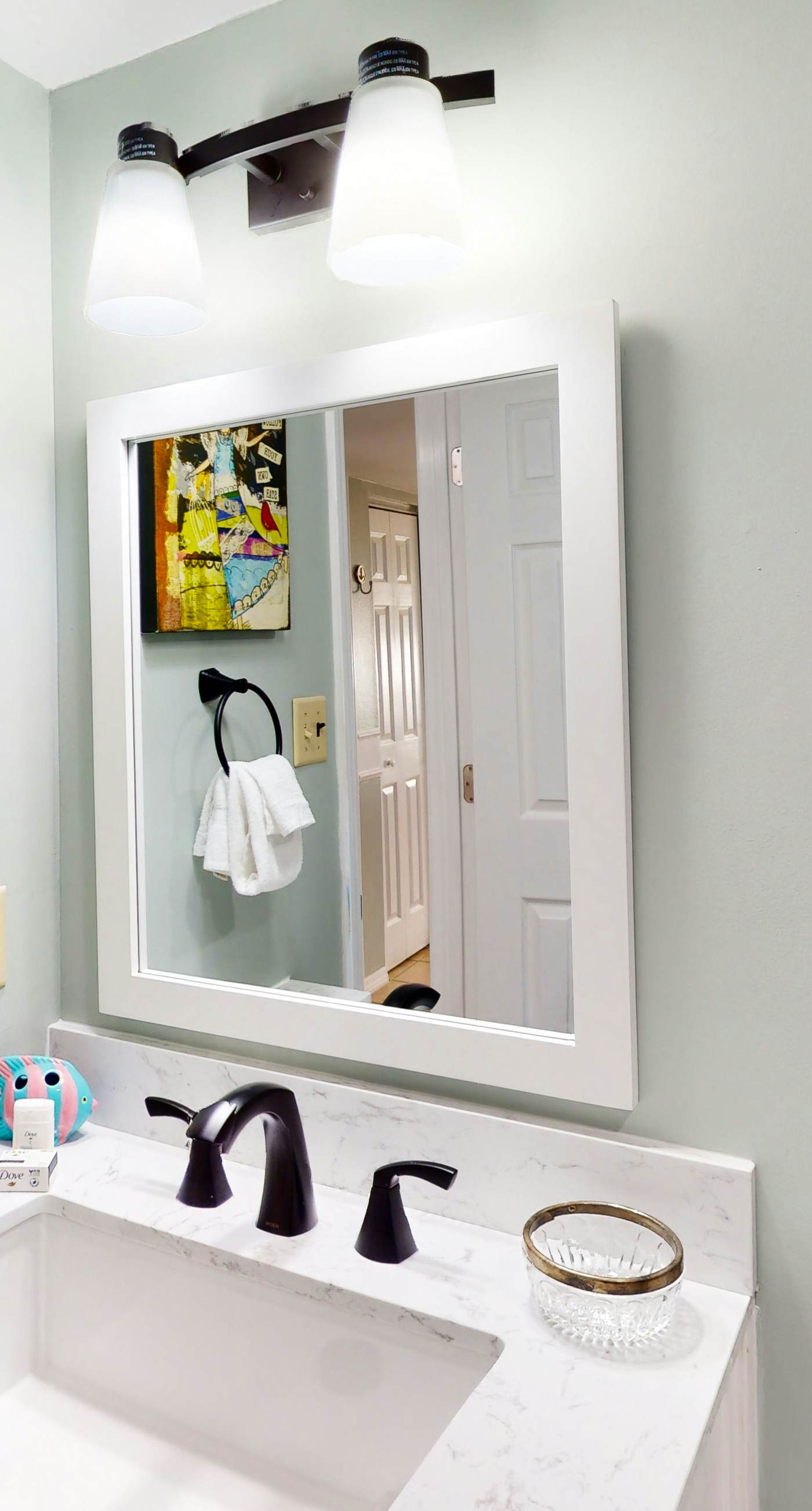 Riverside condo with pool, covered balcony, & easy beach access