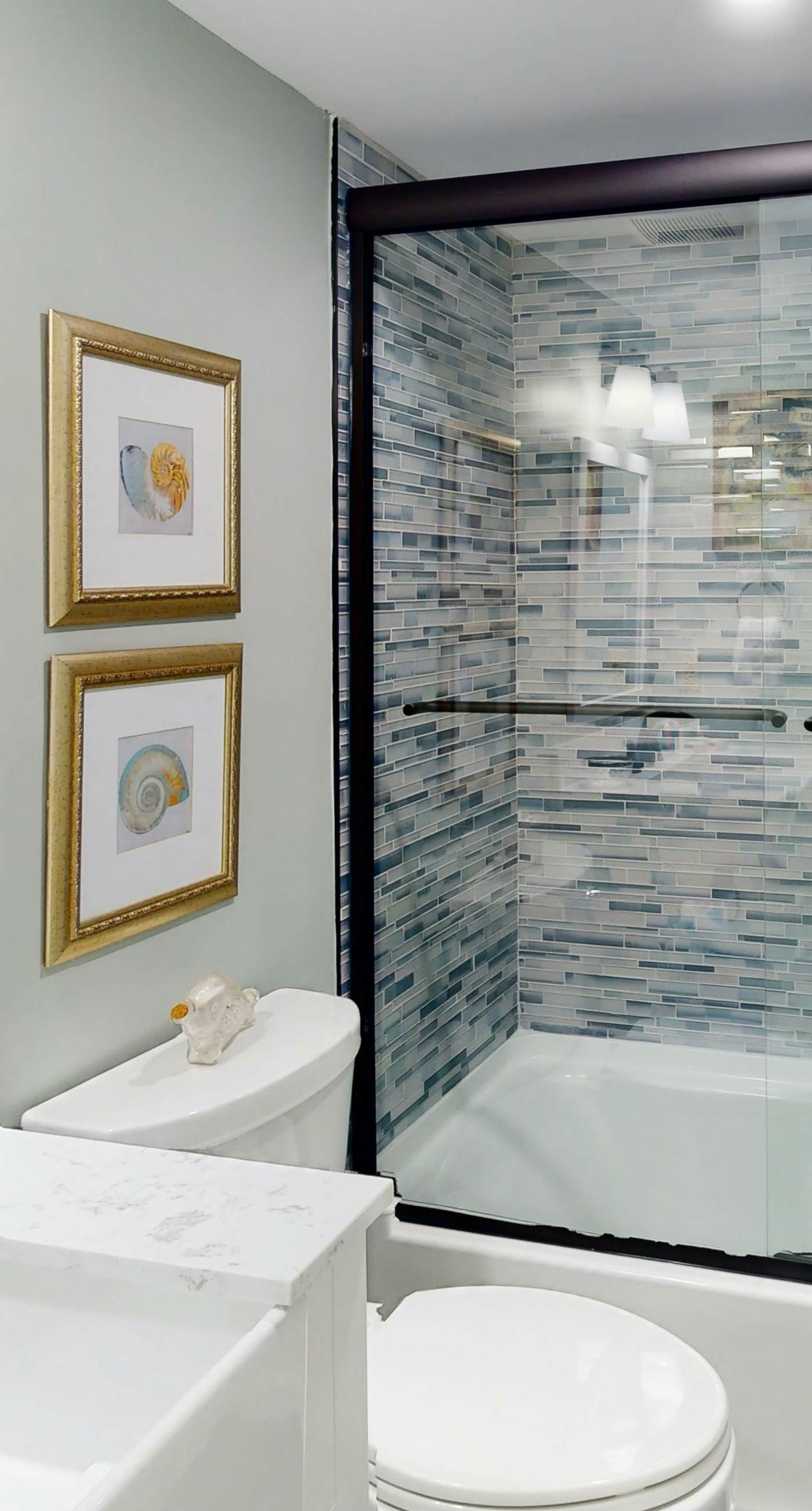 Riverside condo with pool, covered balcony, & easy beach access