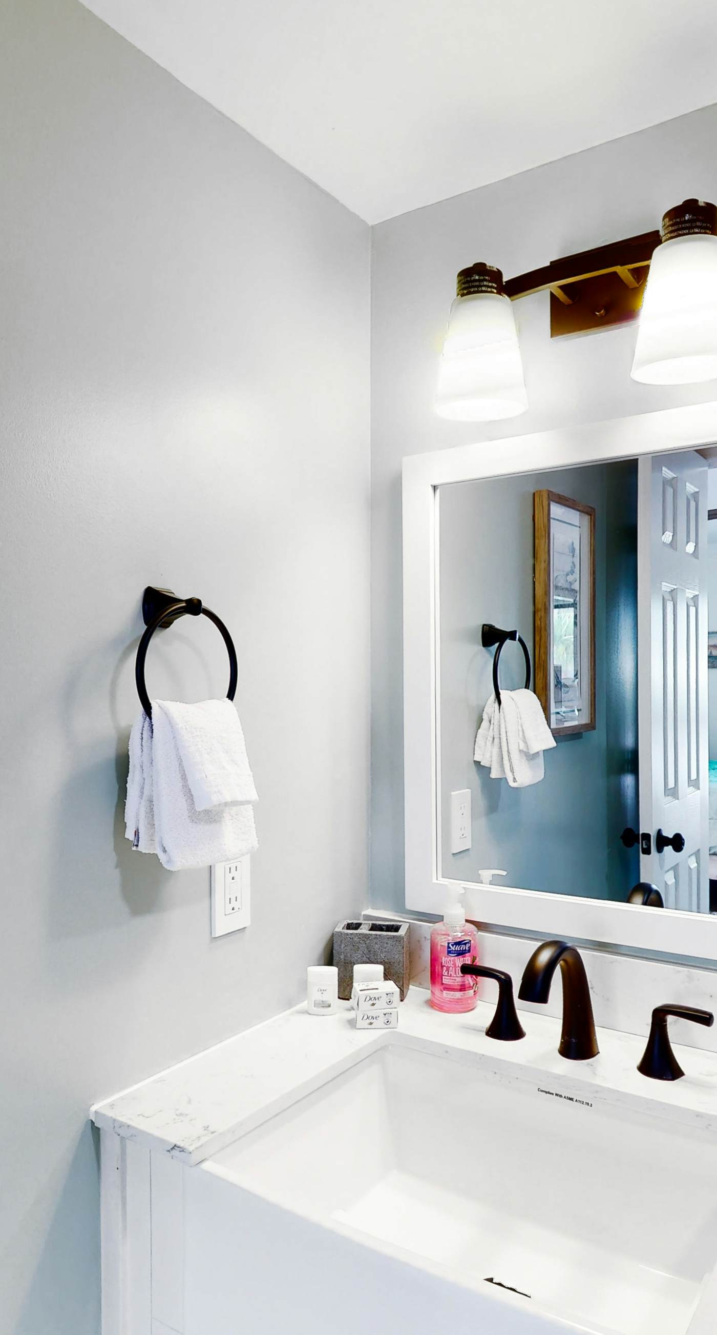 Riverside condo with pool, covered balcony, & easy beach access