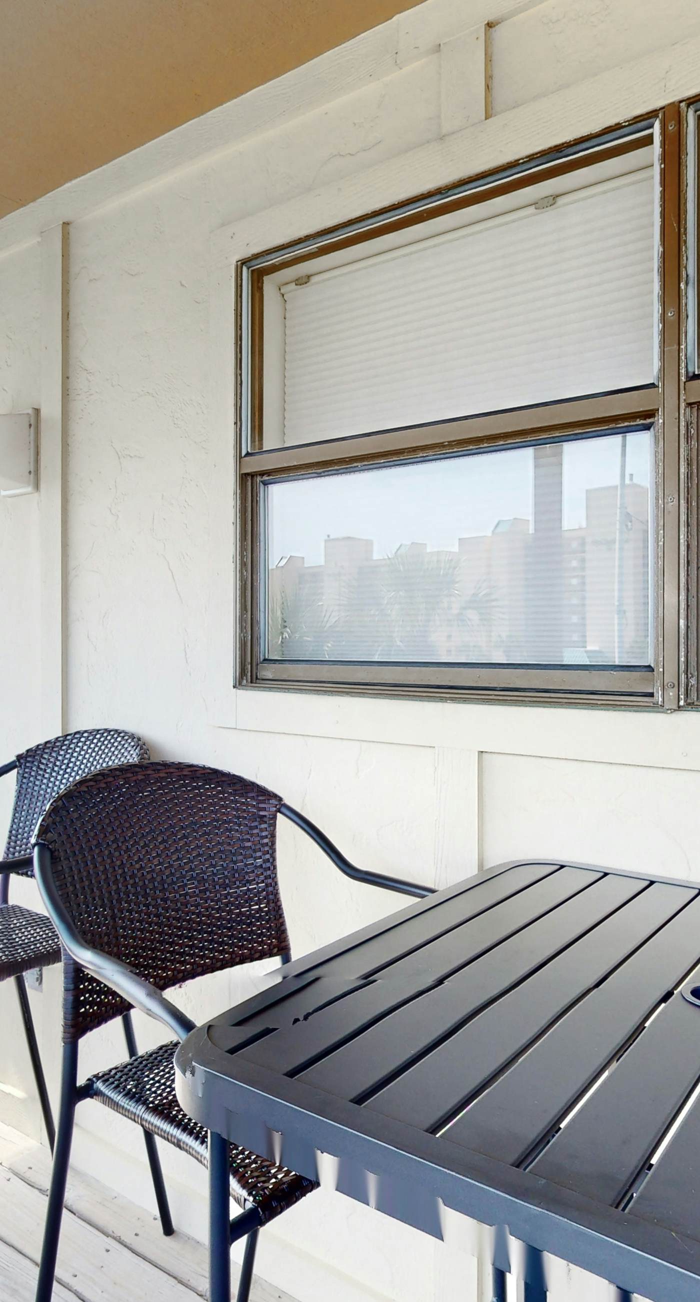 Riverside condo with pool, covered balcony, & easy beach access