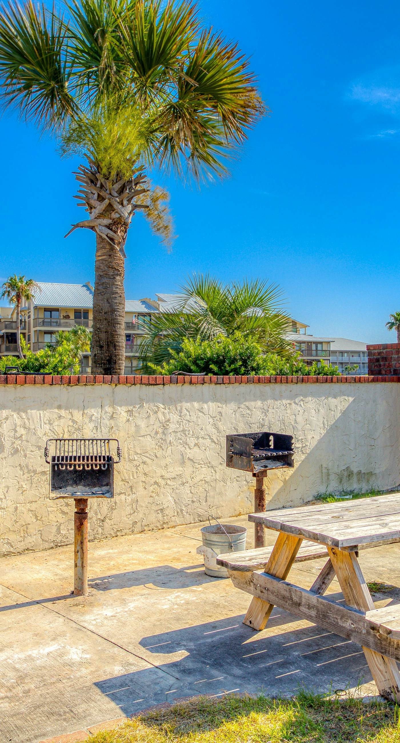 Riverside condo with pool, covered balcony, & easy beach access