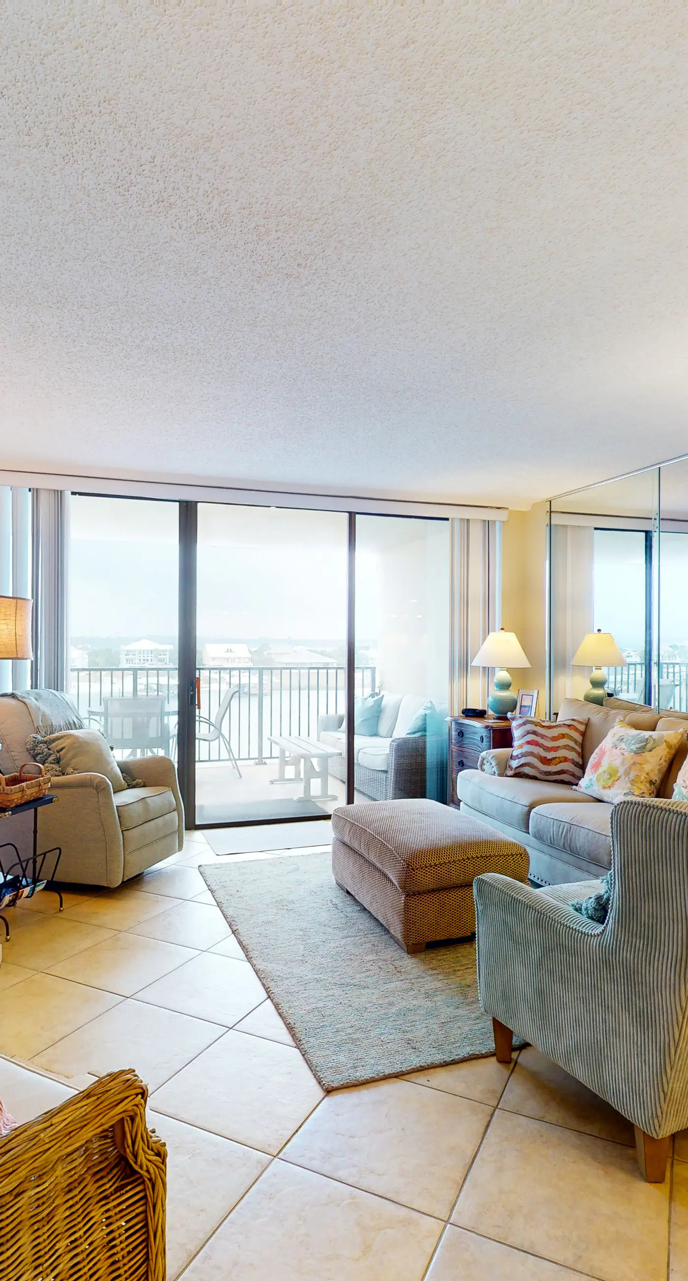 Waterfront 5th-floor condo with river,sunset views, pool, & beach access