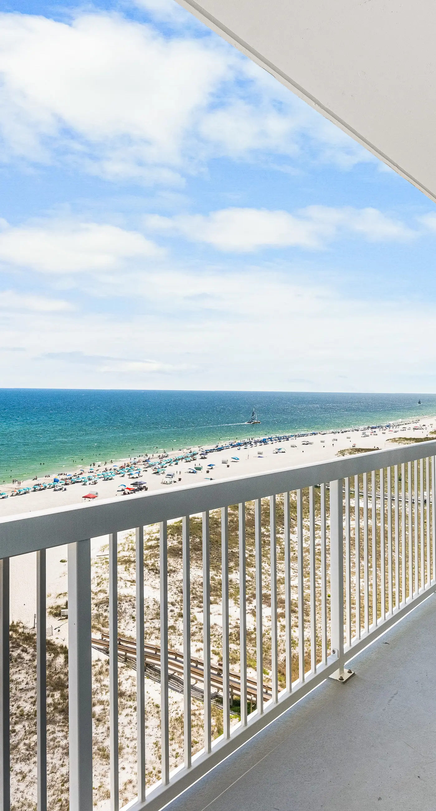 Gulf front condo with pool, beach access, and wrap around balcony