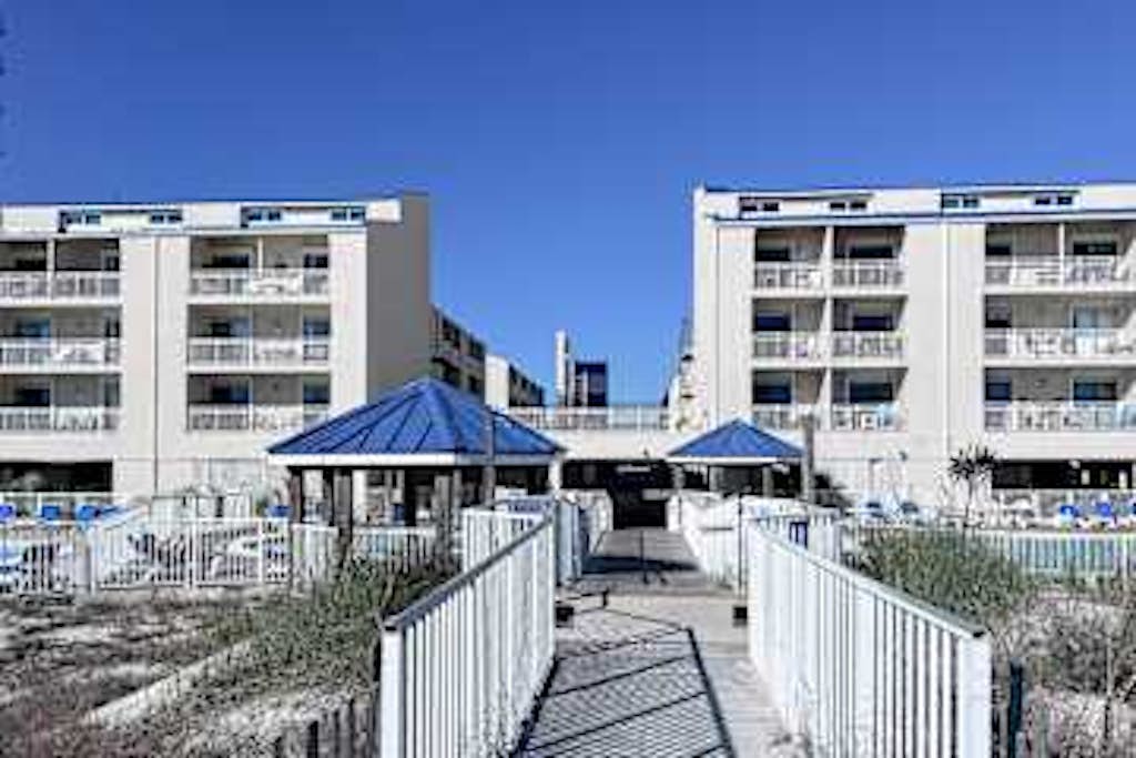 Gulf front condo with onsite snack bar, three shared pools, and internet