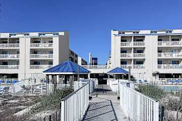 Gulf front condo with onsite snack bar, three shared pools, and internet