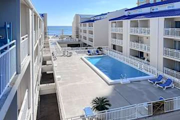 Gulf front condo with onsite snack bar, three shared pools, and internet