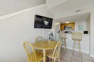 Gulf front condo with onsite snack bar, three shared pools, and internet